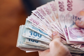 Young man holding some one hundred and two hundred cash banknotes, Close up