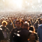 Blurred crowd of unrecognizable at the street