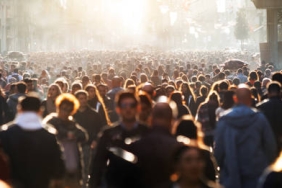 Blurred crowd of unrecognizable at the street