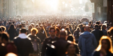 Blurred crowd of unrecognizable at the street
