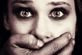depositphotos_9933590-stock-photo-scared-woman-victim-of-domestic